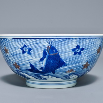 A rare Chinese blue and underglaze red bowl with carps and marine animals, Xuande mark, Kangxi